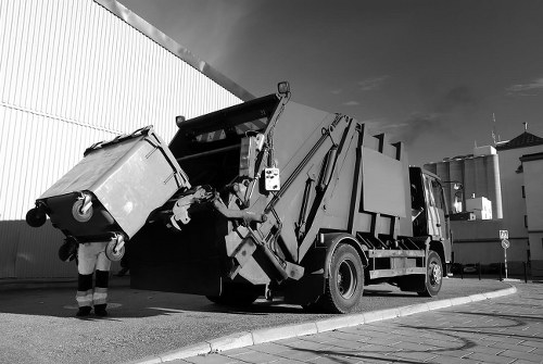 Professional home clearance team sorting items in a Bethnal Green home